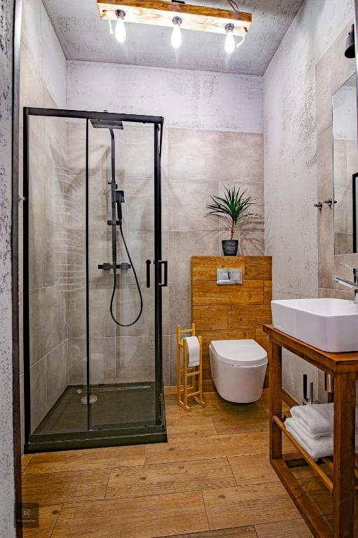 Kúpeľňa v ubytovaní Apartamenty Wyszyńskiego 2
