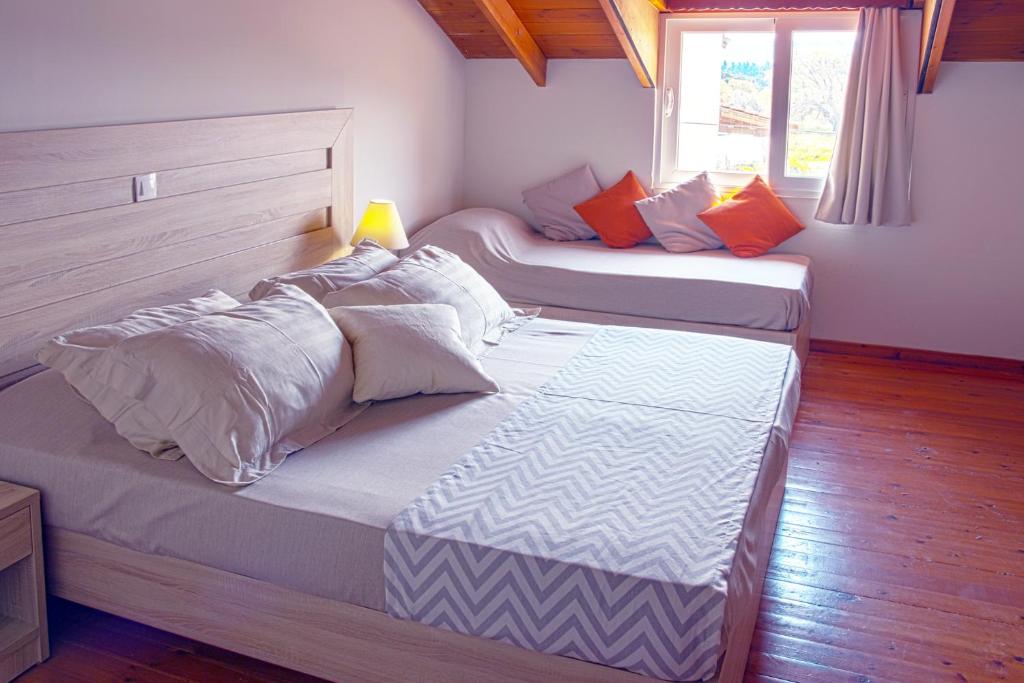Postel nebo postele na pokoji v ubytování Amira Hotel Rhodes
