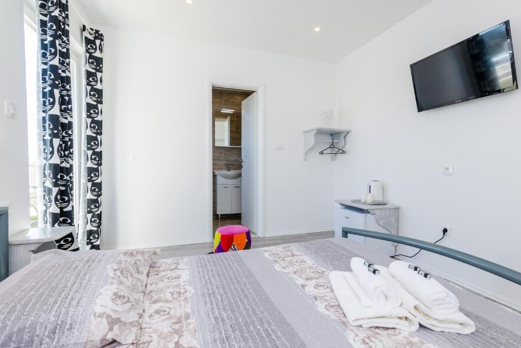 Posteľ alebo postele v izbe v ubytovaní Guest House Nikolina