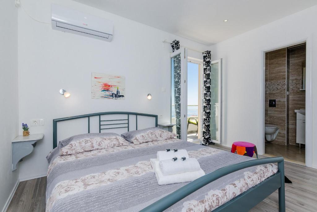 Posteľ alebo postele v izbe v ubytovaní Guest House Nikolina