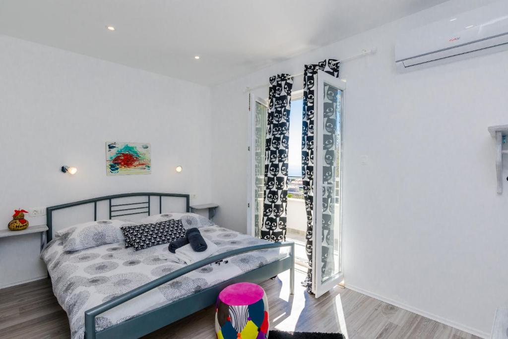 Posteľ alebo postele v izbe v ubytovaní Guest House Nikolina
