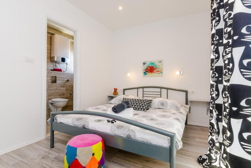 Posteľ alebo postele v izbe v ubytovaní Guest House Nikolina