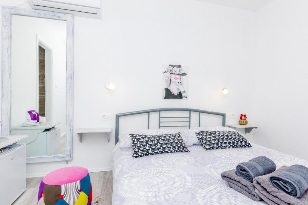 Posteľ alebo postele v izbe v ubytovaní Guest House Nikolina