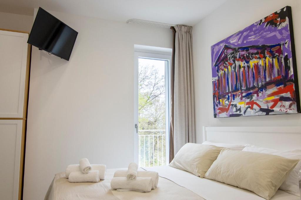 Postel nebo postele na pokoji v ubytování Anreale Rooms Agropoli