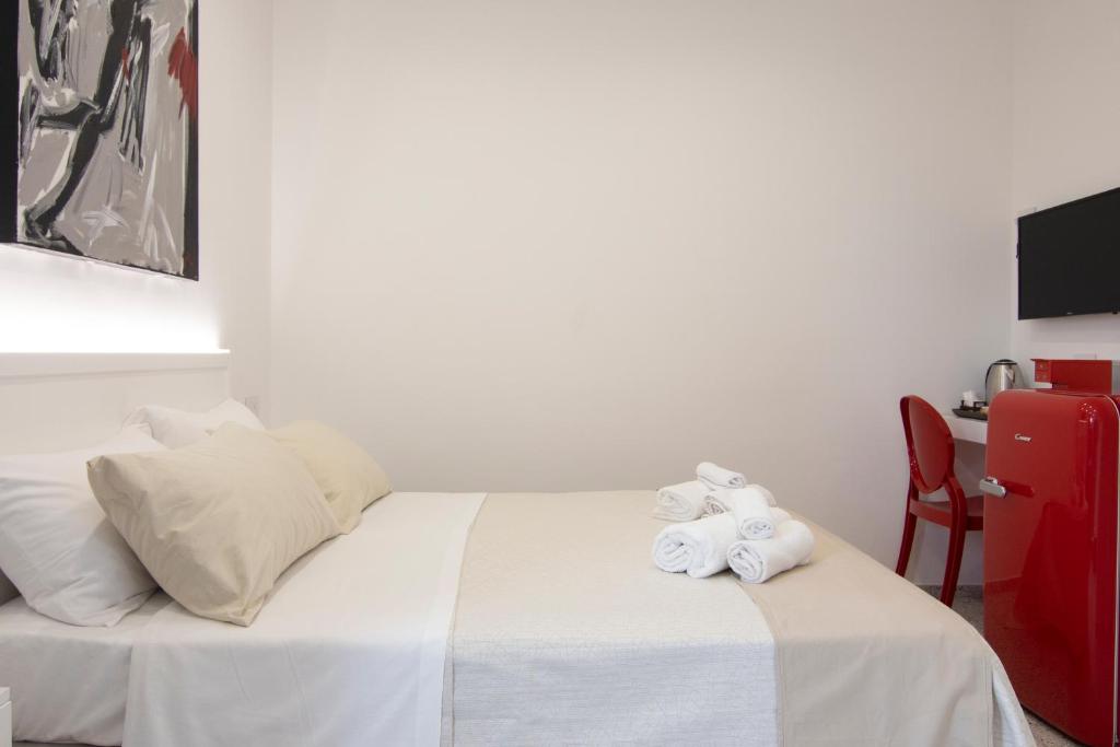 Postel nebo postele na pokoji v ubytování Anreale Rooms Agropoli