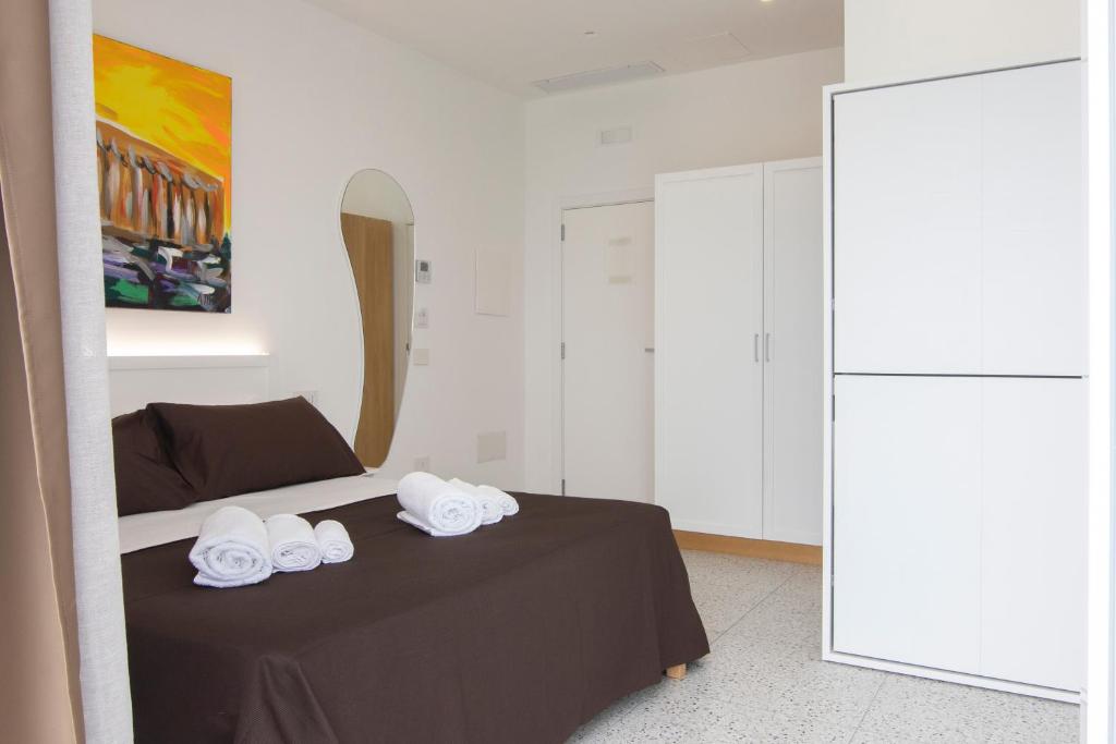 Postel nebo postele na pokoji v ubytování Anreale Rooms Agropoli