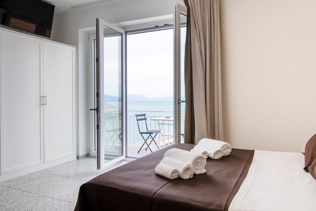 Postel nebo postele na pokoji v ubytování Anreale Rooms Agropoli