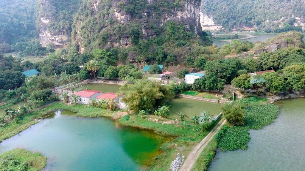 an aerial view of a small island in a river at Trang An Pristine View homestay in Ninh Binh