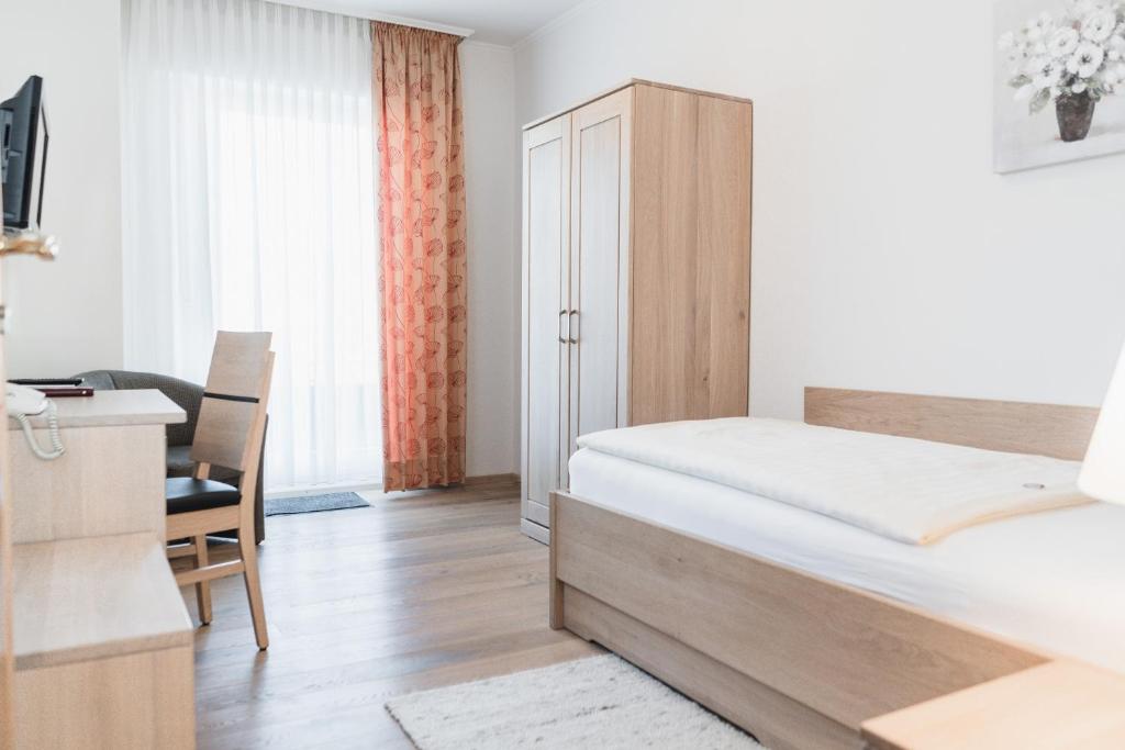 Postel nebo postele na pokoji v ubytování Bio-Hotel Melter