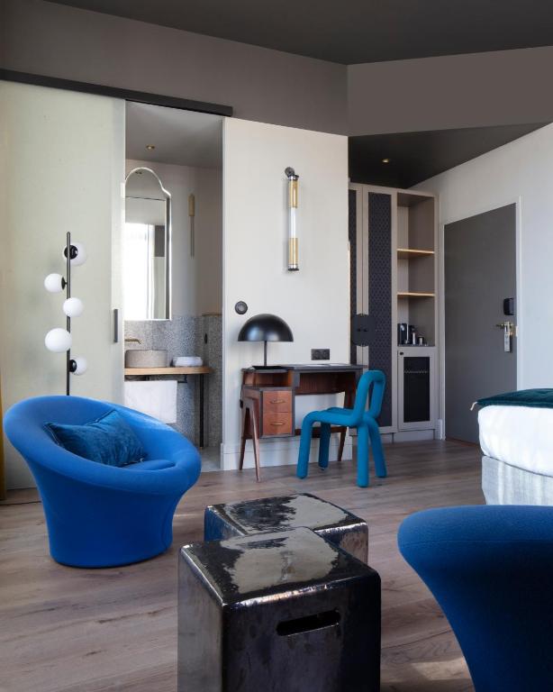 Posezení v ubytování Hôtel de l'Abbaye Lyon - Boutique Hôtel
