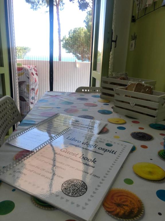 a table with a table cloth on top of it at Appartamento Affaccio sul mare, Baia di Copanello in Copanello