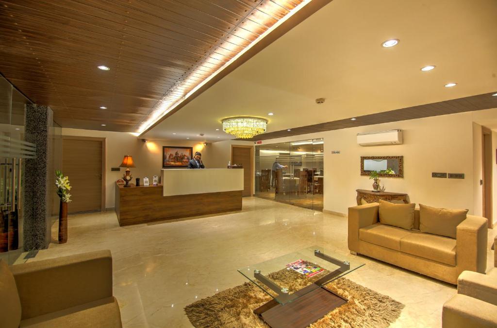 TV a/nebo společenská místnost v ubytování Hotel 91 Huda City Centre