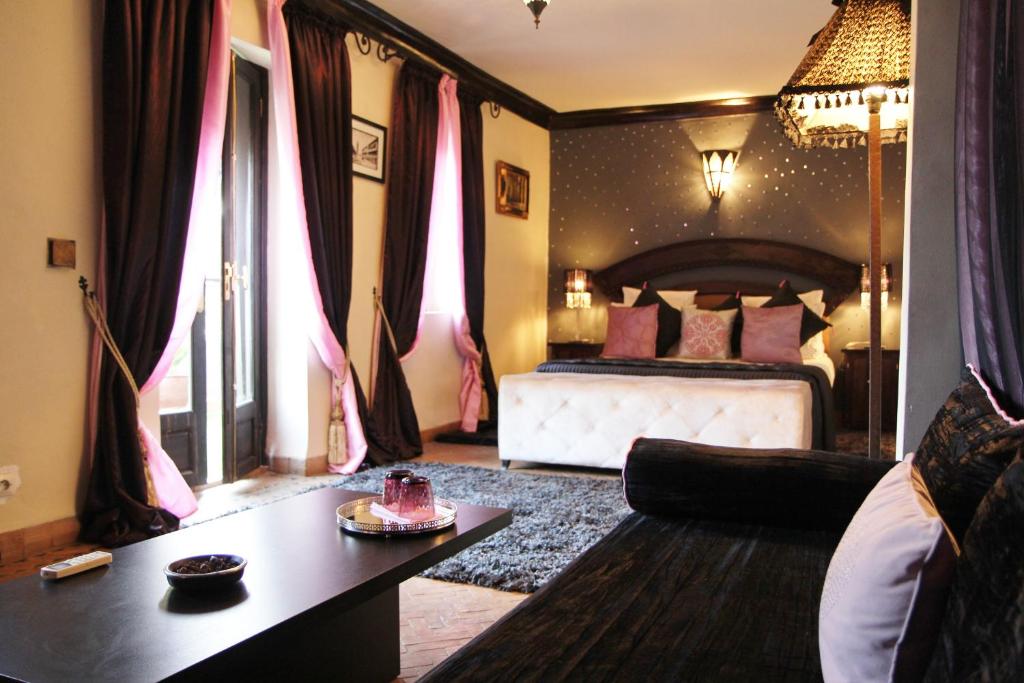 Postel nebo postele na pokoji v ubytování Riad Terra Bahia
