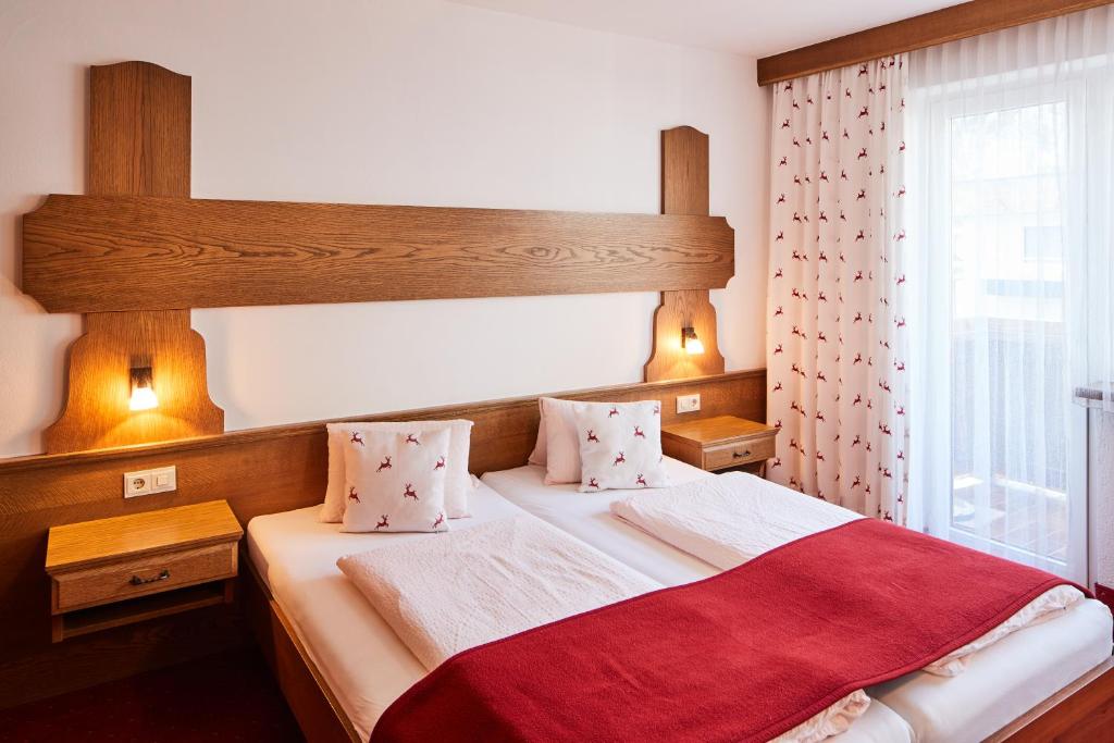 Postel nebo postele na pokoji v ubytování Appartements Sailer
