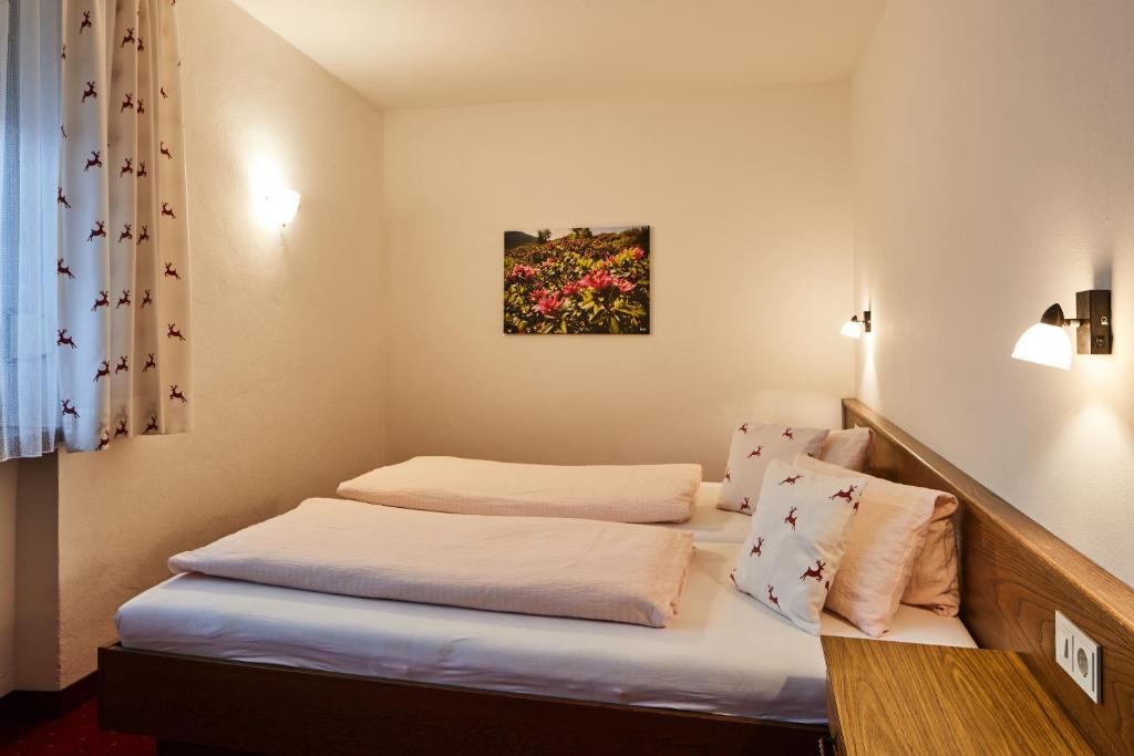 Postel nebo postele na pokoji v ubytování Appartements Sailer