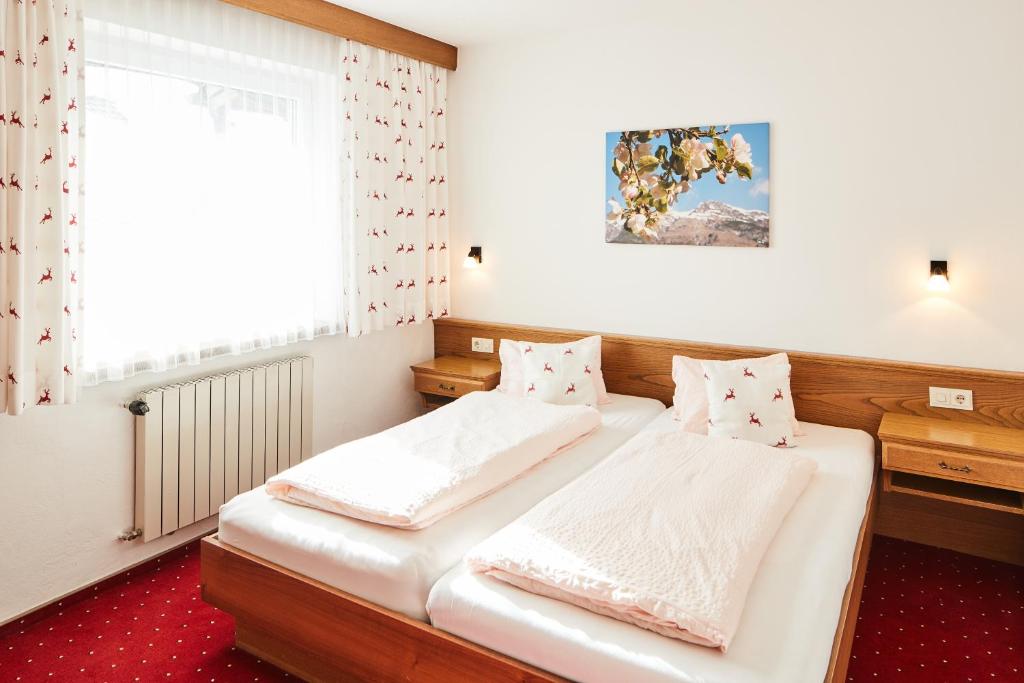 Postel nebo postele na pokoji v ubytování Appartements Sailer