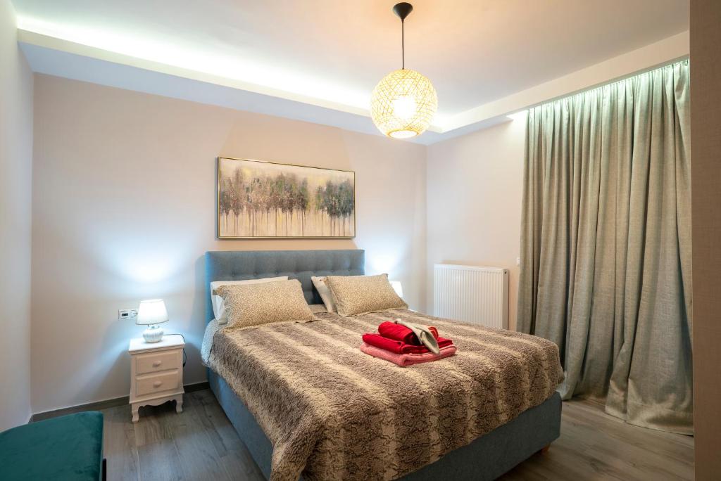 Posteľ alebo postele v izbe v ubytovaní Villa Helxis