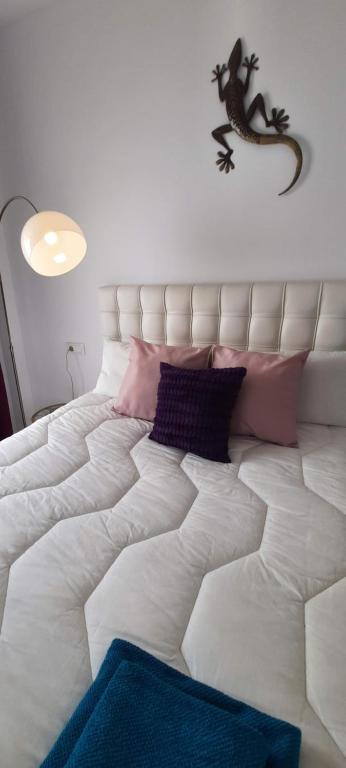 Posteľ alebo postele v izbe v ubytovaní Apartamento Nicolasa