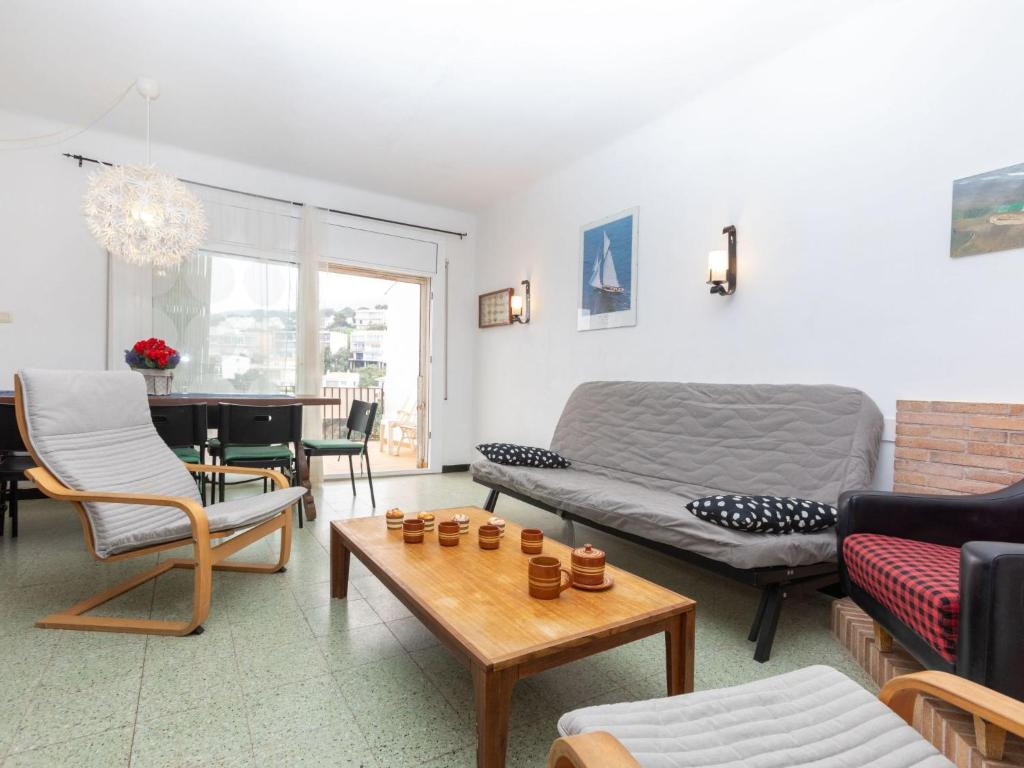 A seating area at Apartment Cambre d'Aze by Interhome