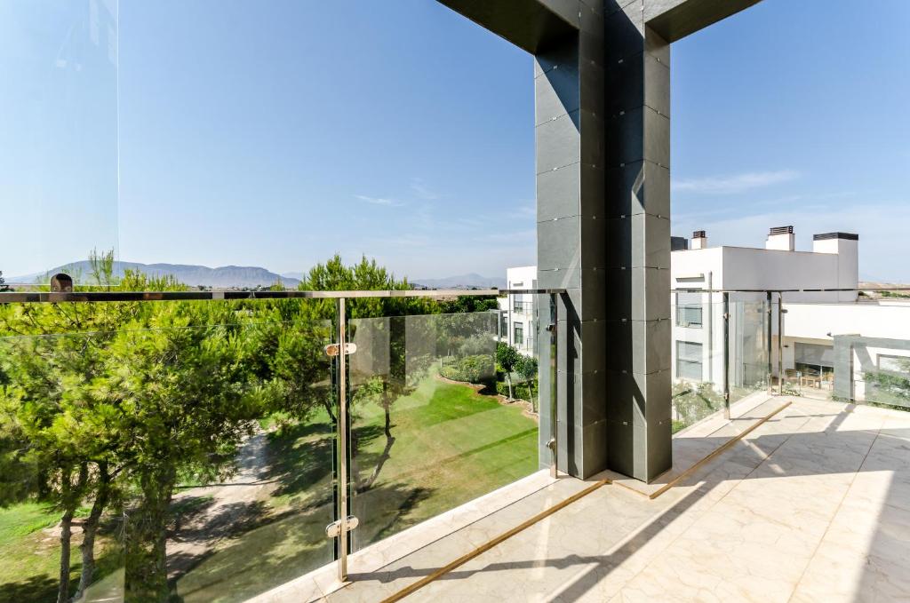 Uma varanda ou terraço em El Plantío Golf Resort