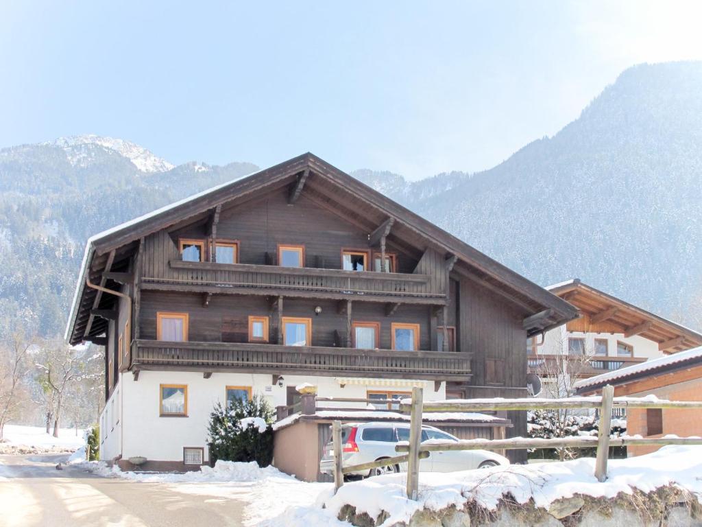 a house with a car parked in front of it at Holiday Home Schrofner - MHO538 by Interhome in Ramsau im Zillertal