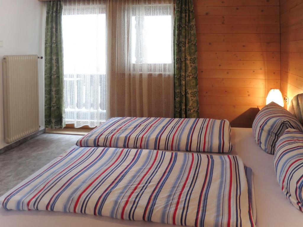Posteľ alebo postele v izbe v ubytovaní Holiday Home Schrofner by Interhome