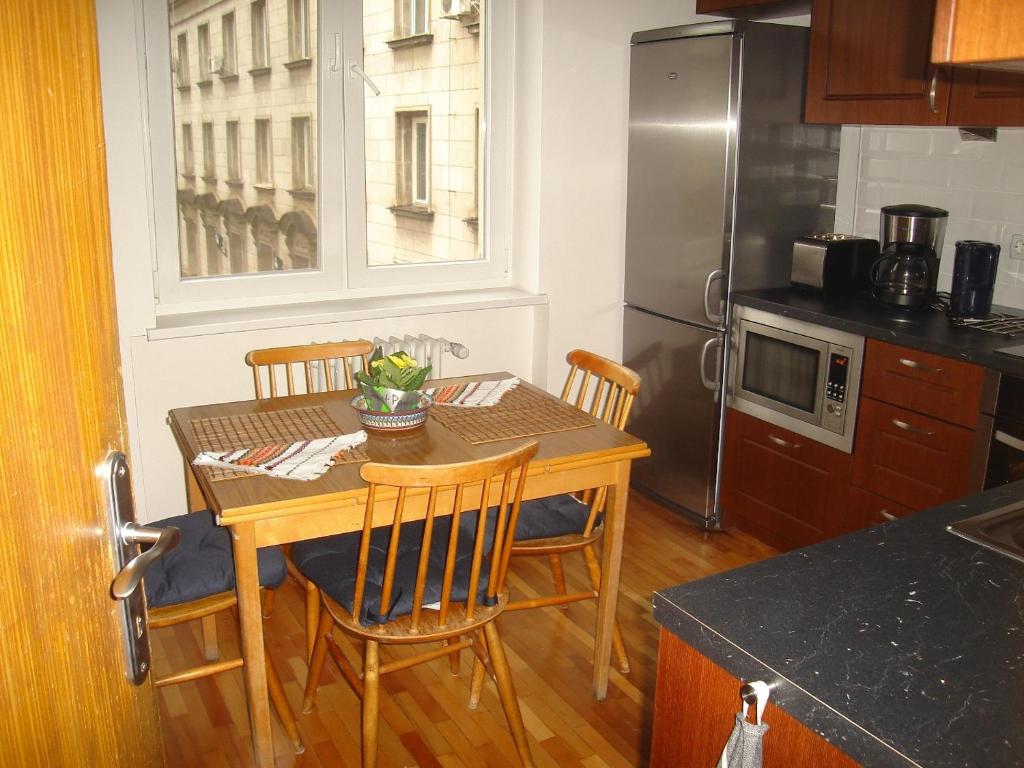 A kitchen or kitchenette at Bulhotel Pritzker Apartment