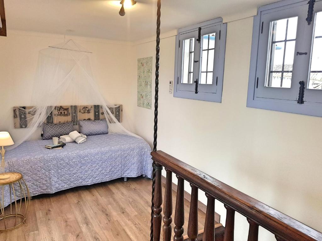 A bed or beds in a room at Riad Mezquita de Cordoba