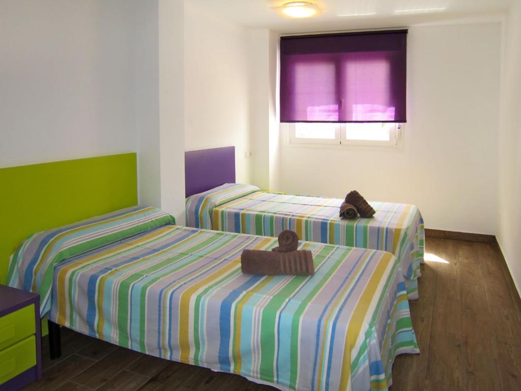 Posteľ alebo postele v izbe v ubytovaní Holiday Home Ayora by Interhome
