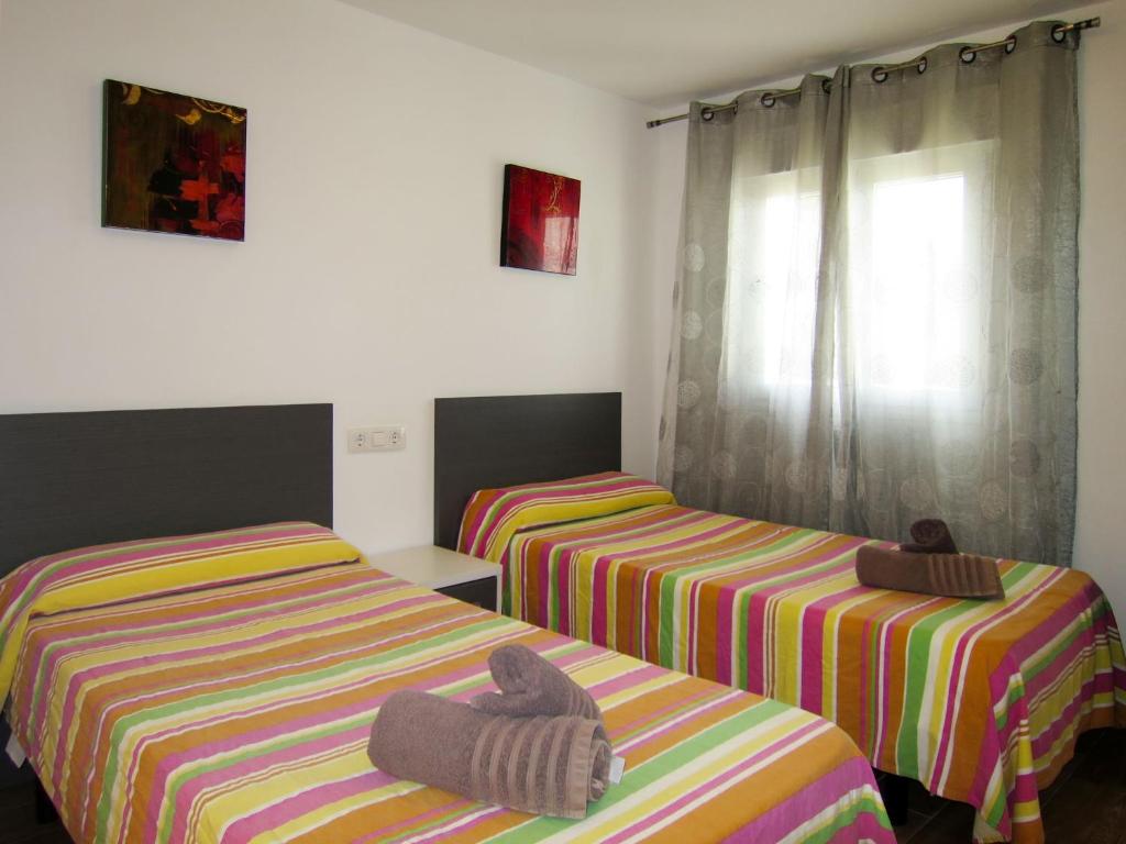 Posteľ alebo postele v izbe v ubytovaní Holiday Home Ayora by Interhome