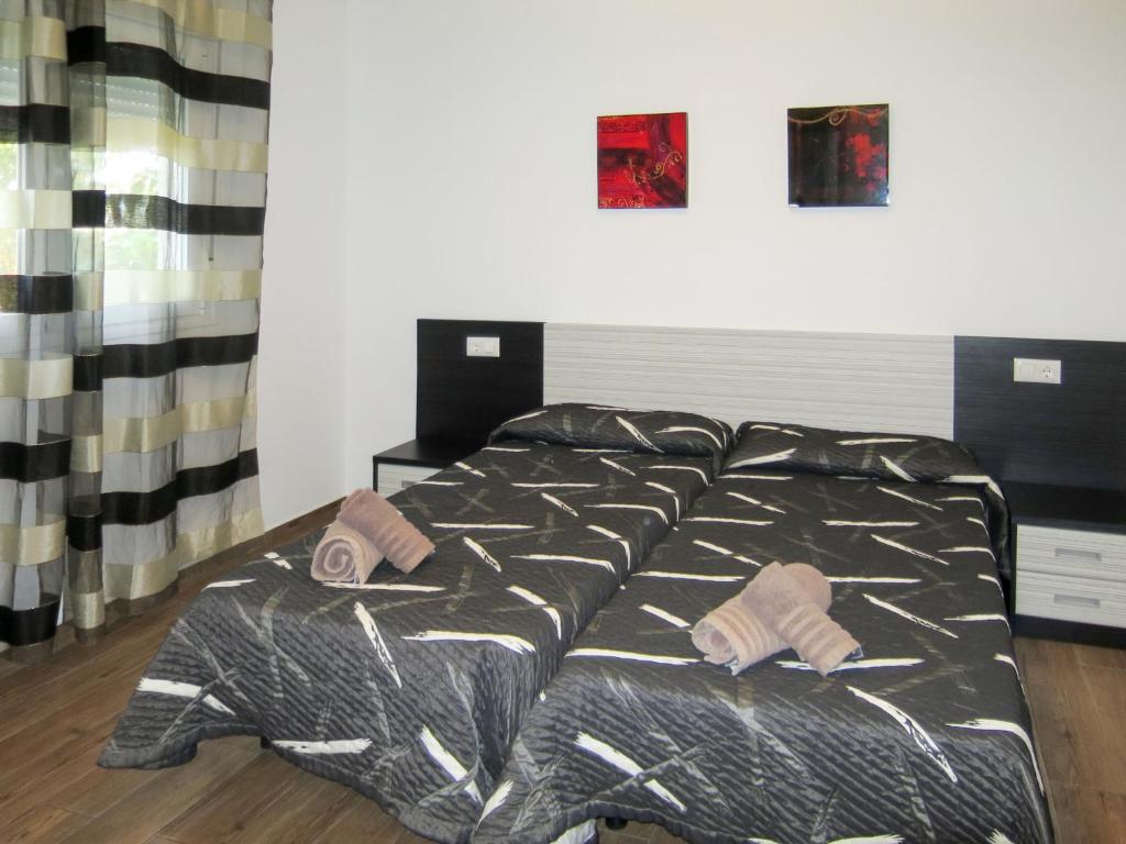 Posteľ alebo postele v izbe v ubytovaní Holiday Home Ayora by Interhome