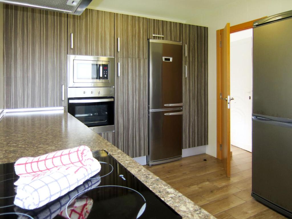 Kuchyňa alebo kuchynka v ubytovaní Holiday Home Ayora by Interhome