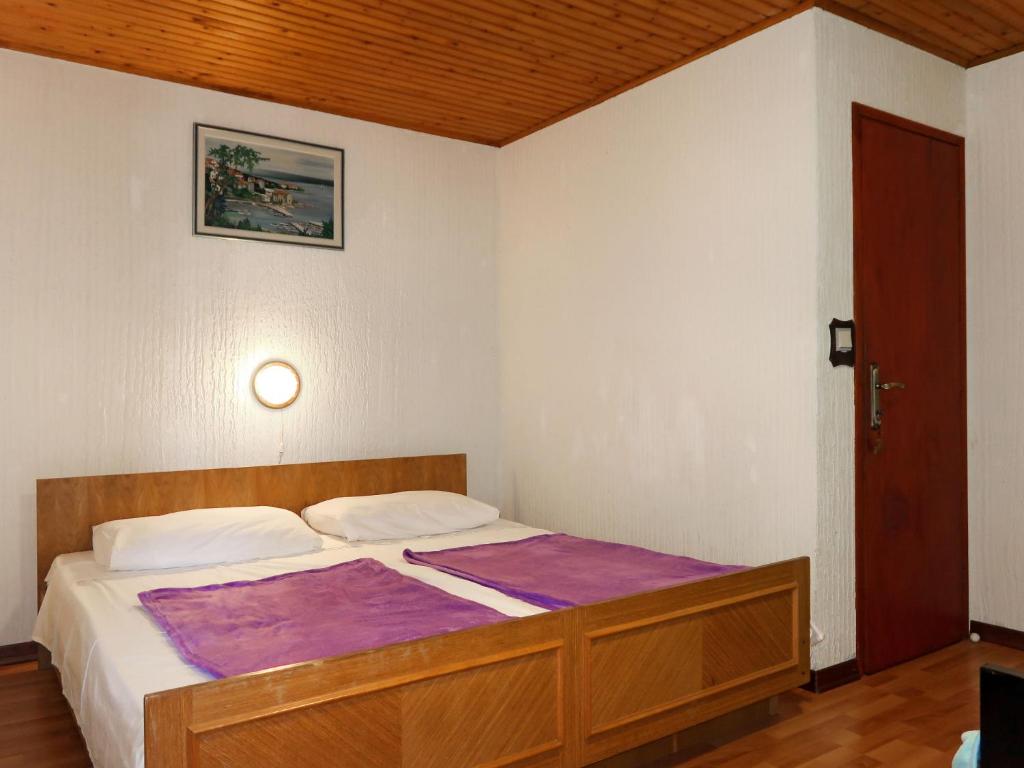 Postel nebo postele na pokoji v ubytování Holiday Home Delfar by Interhome