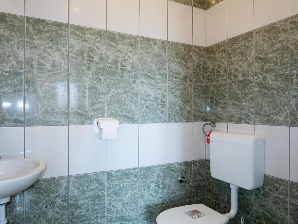 Kúpeľňa v ubytovaní Apartment Golic-2 by Interhome