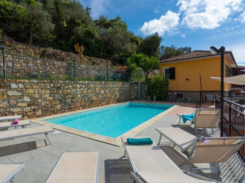 The swimming pool at or close to Apartment Arancia - PTB153 by Interhome