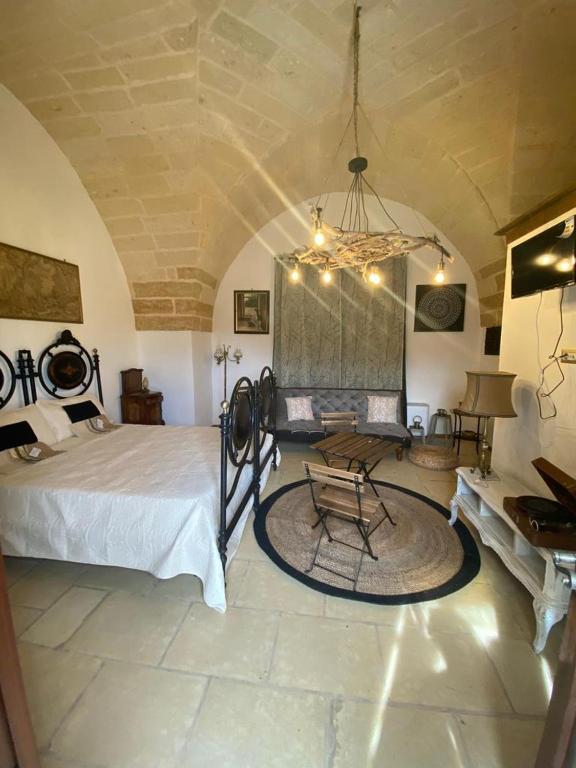 Postel nebo postele na pokoji v ubytování Masseria li Vecchi
