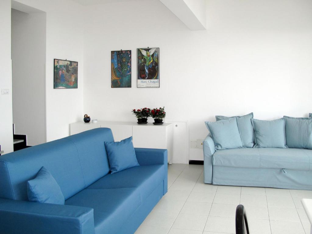 A seating area at Holiday Home Giorgia - BGB100 by Interhome