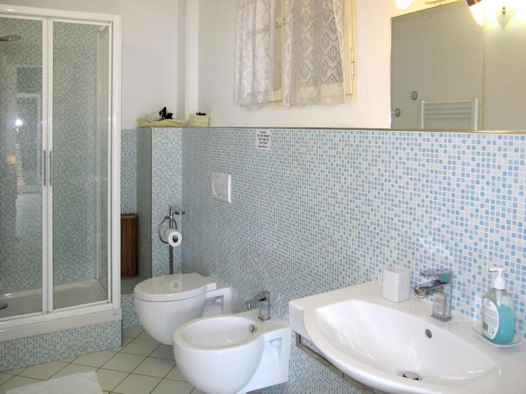 A bathroom at Apartment Arco - SLR350 by Interhome