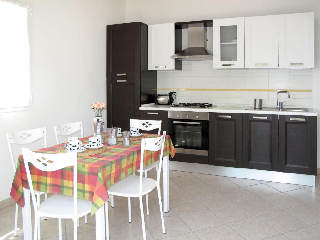 A kitchen or kitchenette at Apartment Arco - SLR350 by Interhome