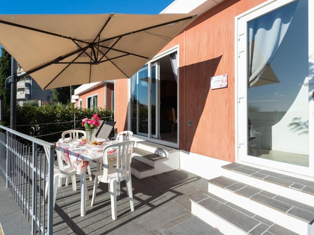 A balcony or terrace at Holiday Home Mandorlo - SLR401 by Interhome