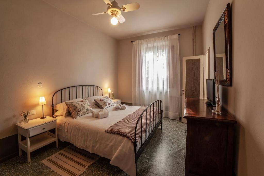 Postel nebo postele na pokoji v ubytování Locanda agricola Posapiano