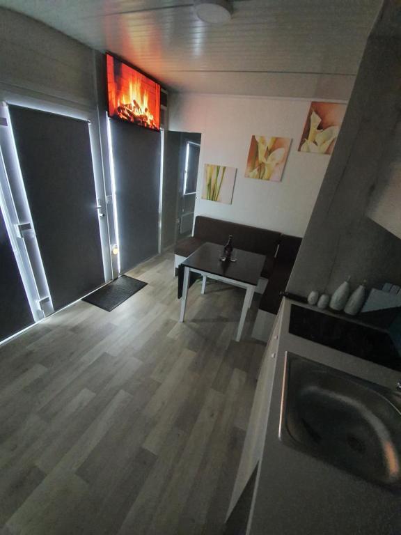 Posezení v ubytování Roof Apartment ART-PE