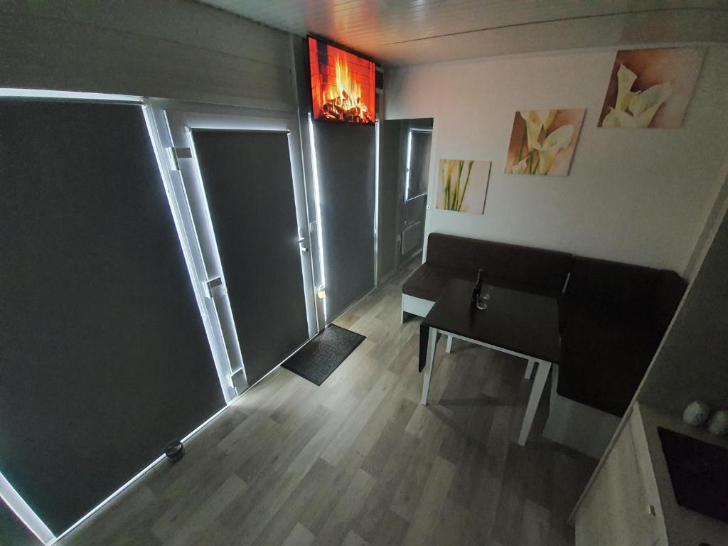 Posezení v ubytování Roof Apartment ART-PE