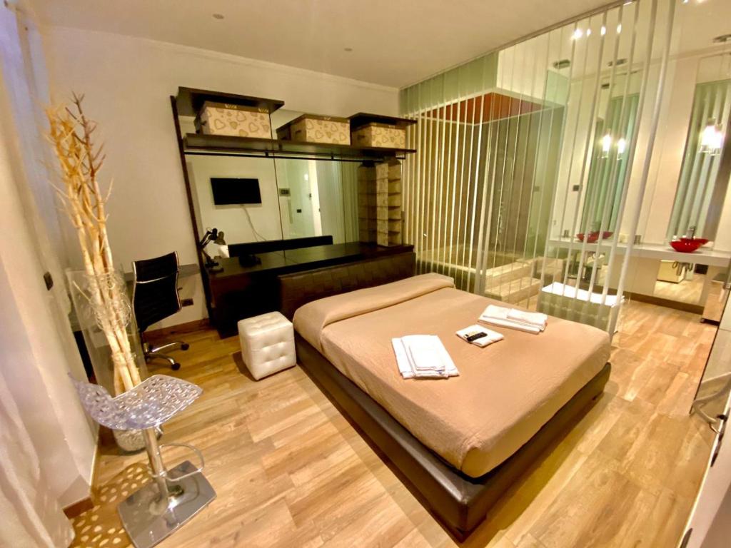 Telewizja i/lub zestaw kina domowego w obiekcie HH Hermoso Housing ALESSANDRIA