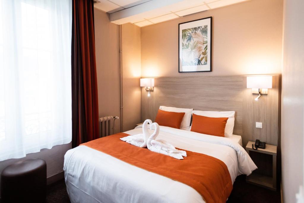 Postel nebo postele na pokoji v ubytování Hotel Regina & Spa