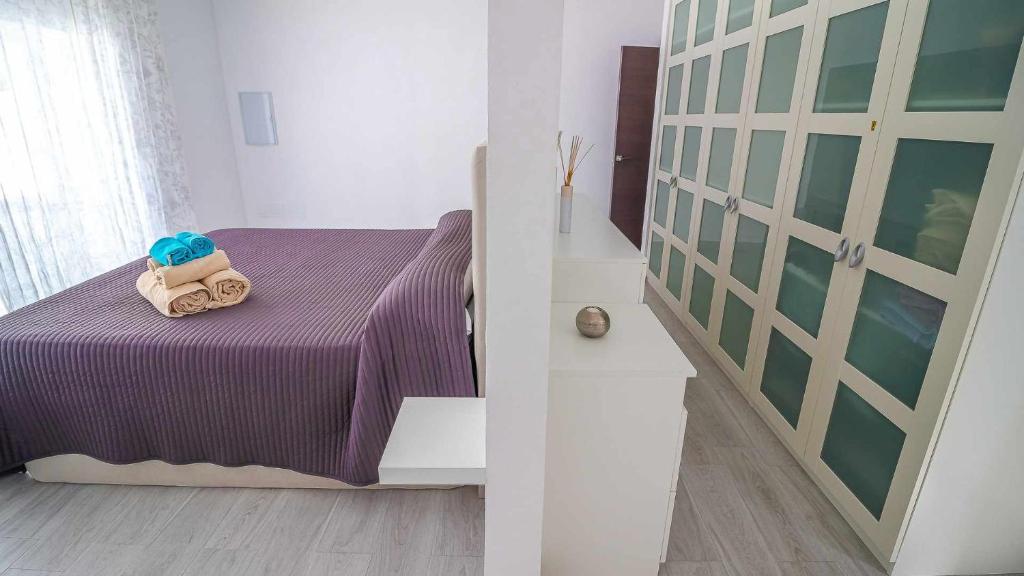 Postel nebo postele na pokoji v ubytování Casa Rural Villa M&J