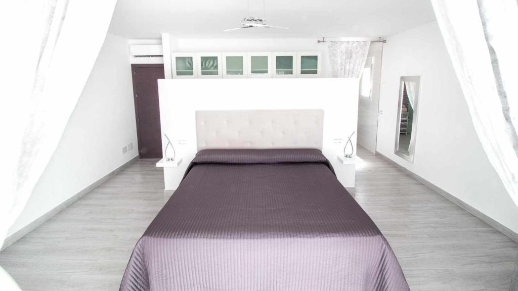 Postel nebo postele na pokoji v ubytování Casa Rural Villa M&J