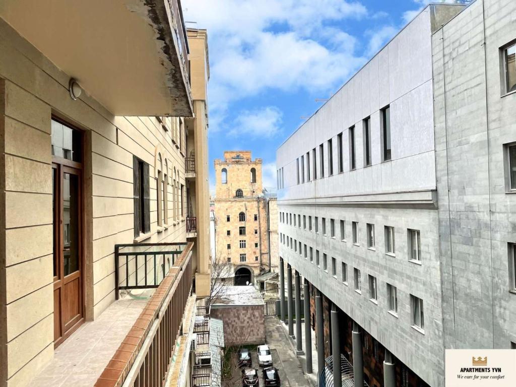 a view of an alley between two buildings at Armenak Apartment Near To Republic Square in Yerevan
