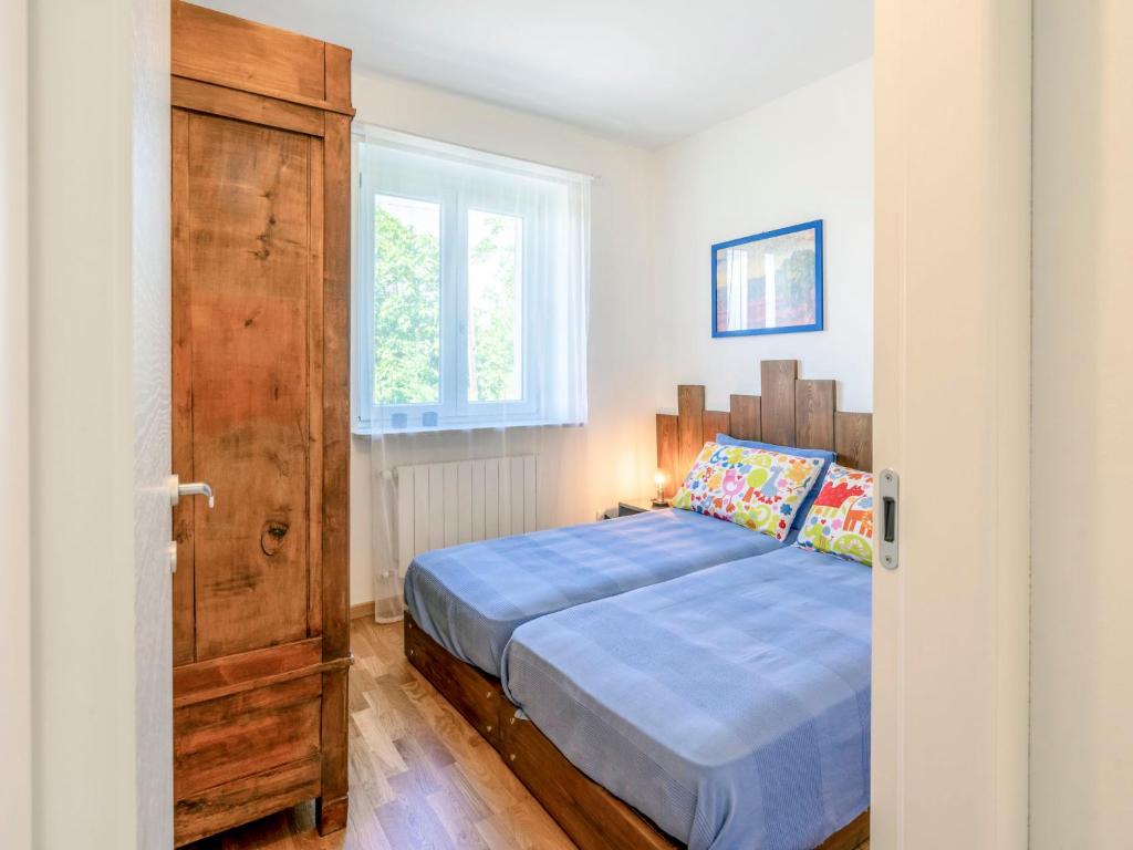 Posteľ alebo postele v izbe v ubytovaní Holiday Home di Sara by Interhome