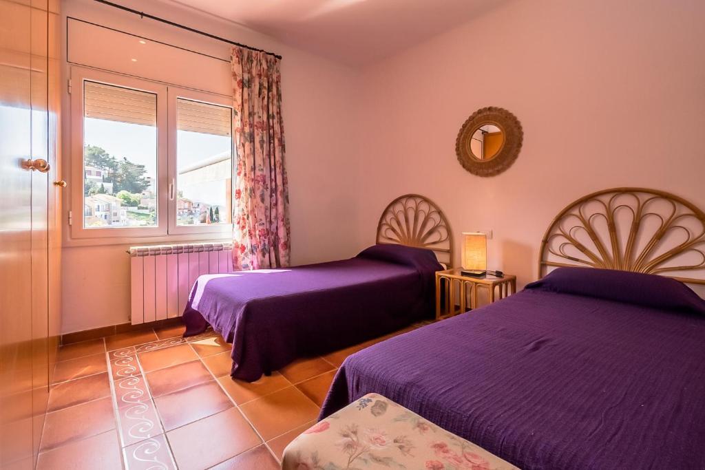 Postel nebo postele na pokoji v ubytování B-47 BEGUR 8PaX